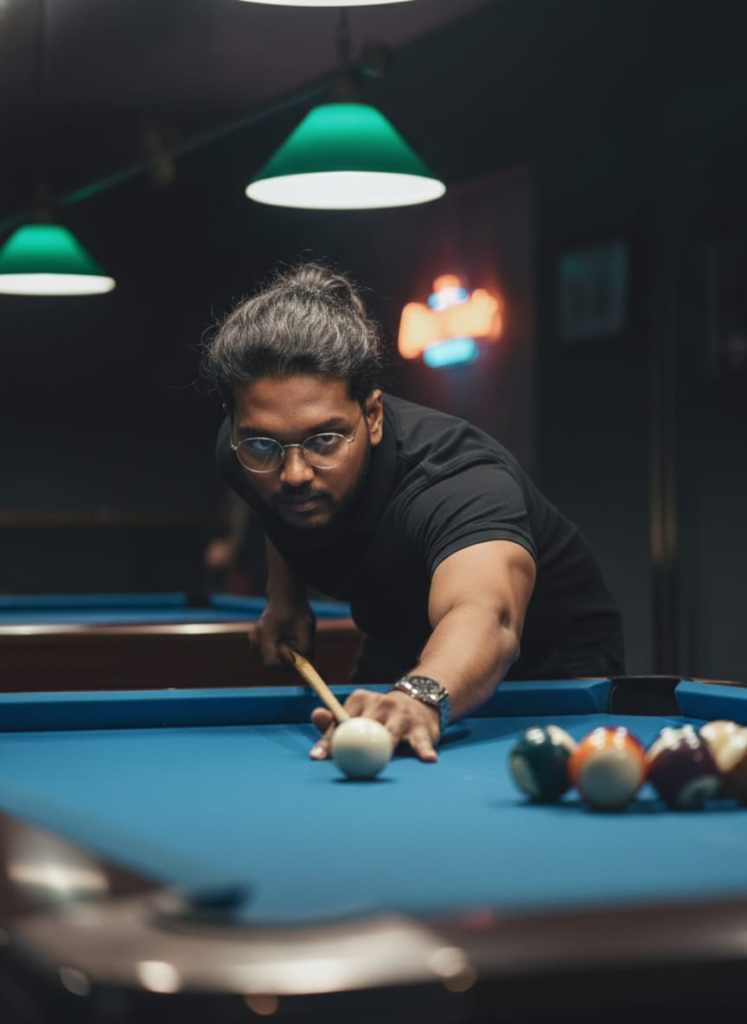 A focused person aiming a cue stick to strike the cue ball on a blue pool table under hanging lights.